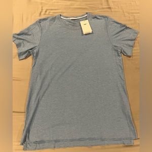 Nike mens M dri fit light blue, new never worn WITHOUT tags.